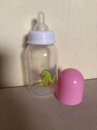 Muñeco bebé niña con biberon 