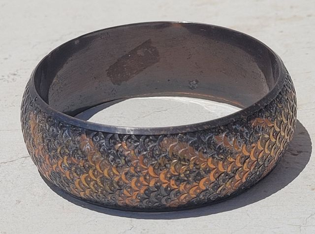 Pulsera marrón y dorada