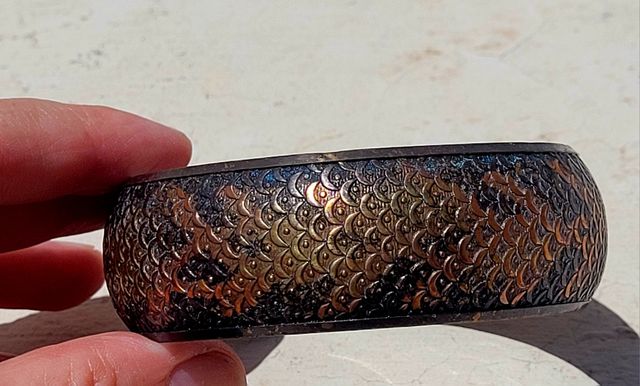 Pulsera marrón y dorada