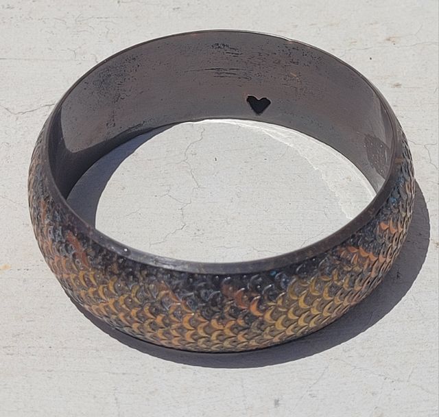 Pulsera marrón y dorada