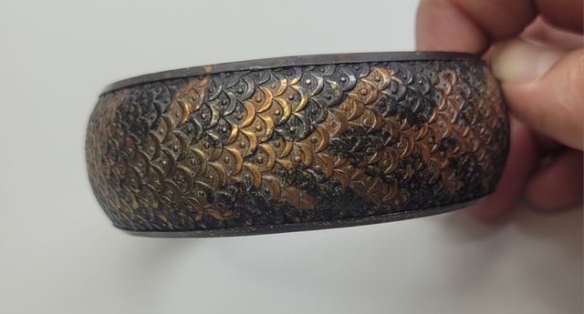 Pulsera marrón y dorada