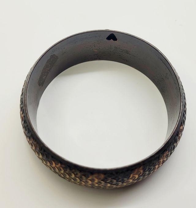 Pulsera marrón y dorada