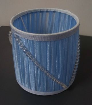 Paralumi azzurro in tessuto plissettato