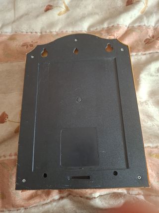 Reloj de pared marrón antiguo