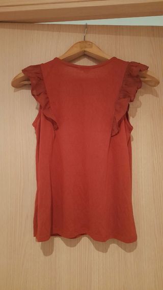 Blusa naranja oscuraSpringfield sin mangas