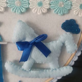 Quadro nascita bimbo pannolenci