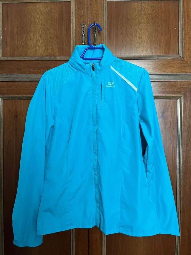 Chaqueta paravientos Decathlon turquesa mujer