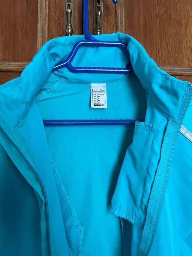 Chaqueta paravientos Decathlon turquesa mujer