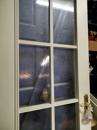 Puerta madera blanca interior con cristales