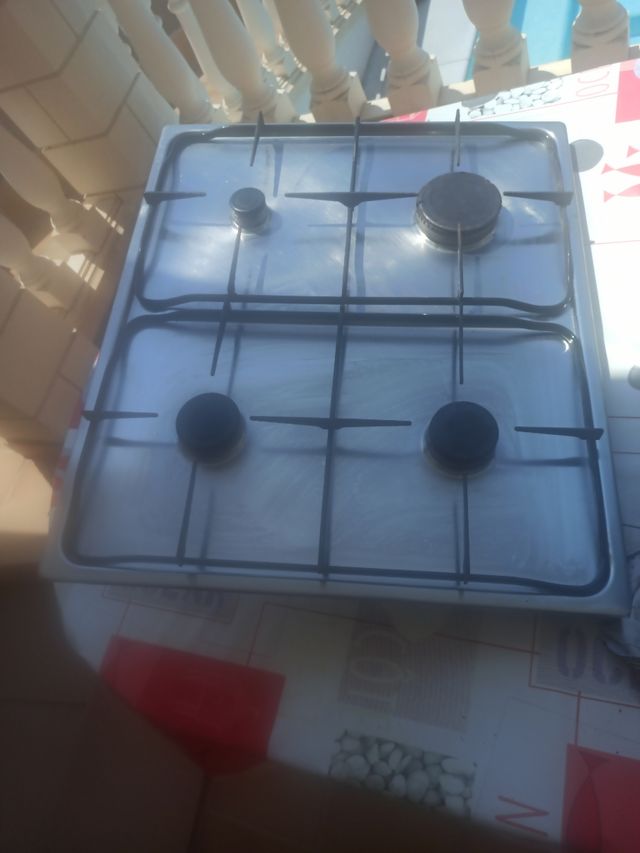 Encimera gas 4 fuegos más horno eléctrico