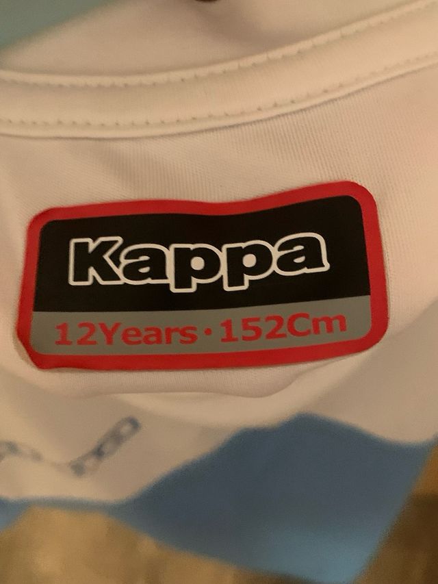 Camiseta Kappa niño celeste-blanca