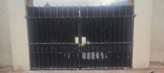 Pareja de puertas de exterior de hierro