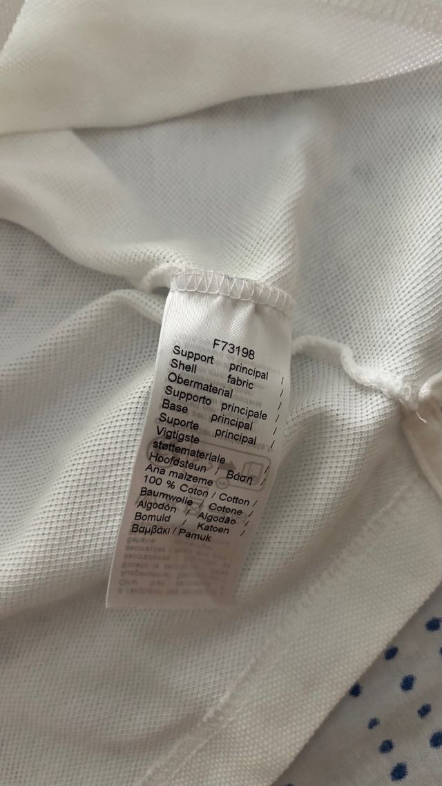 Polo Lacoste blanco talla S