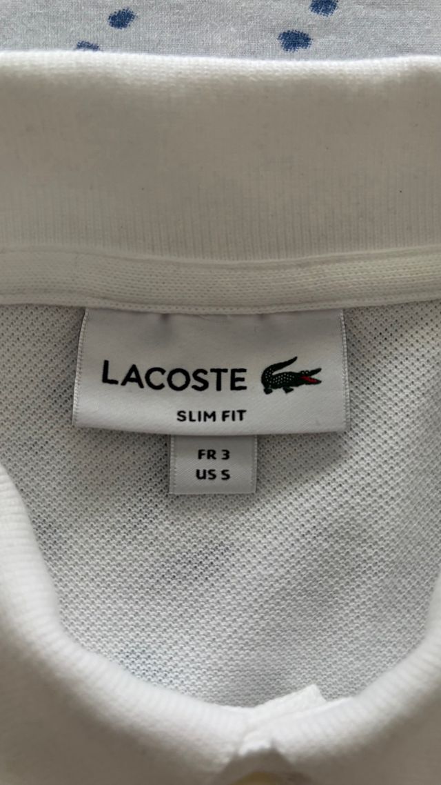 Polo Lacoste blanco talla S