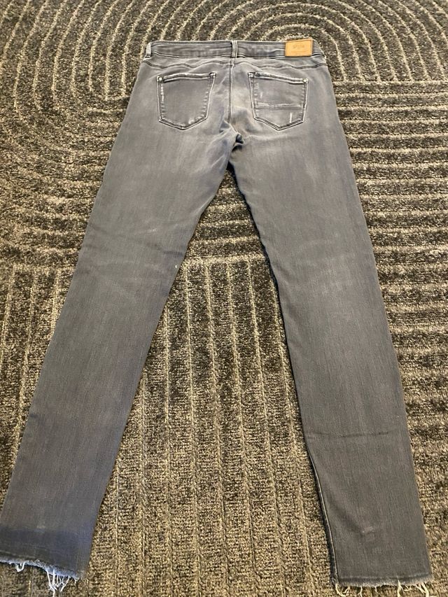 Jeans Sfera grises rotos