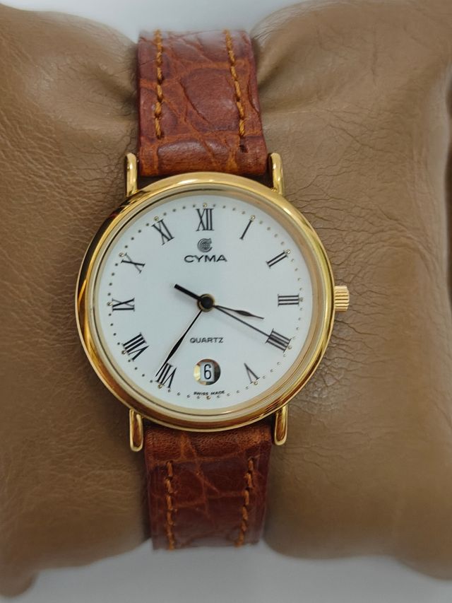 Reloj Cyma cuarzo dorado de segunda mano por 65 EUR en Madrid en
