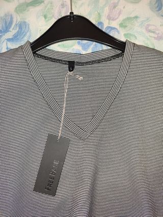 Blusa príncipe de gales con volante en cintura 