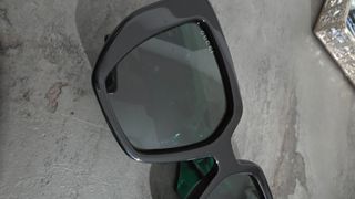 Occhiali Gucci neri e verdi