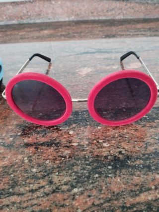 Gafas sol redondas rojas