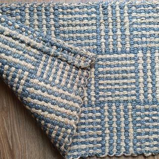 Alfombra de yute azul y beige