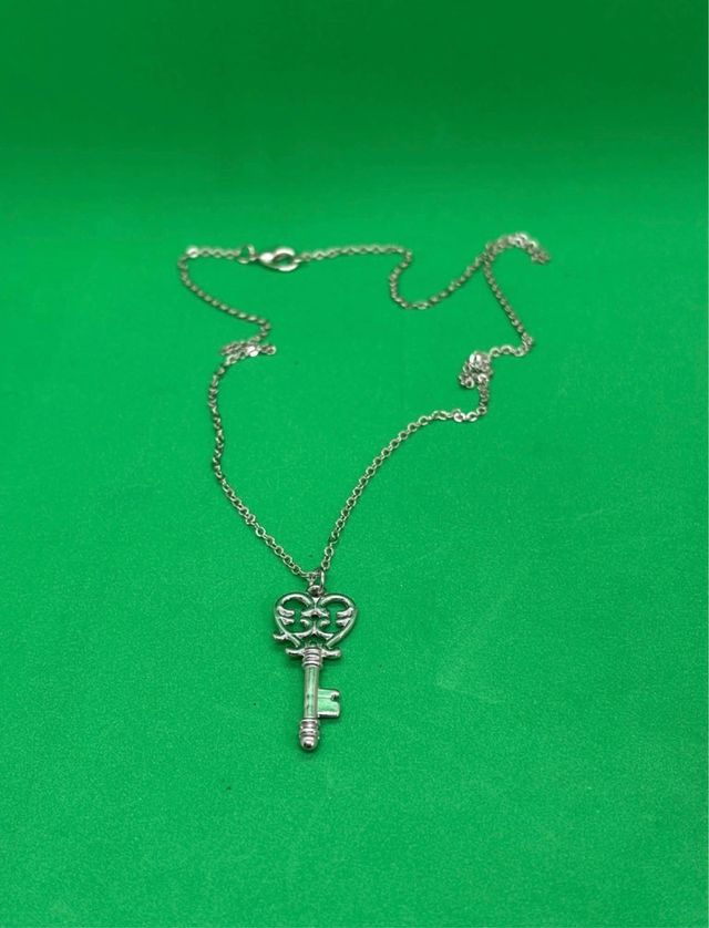 Colgante llave corazón acero inox