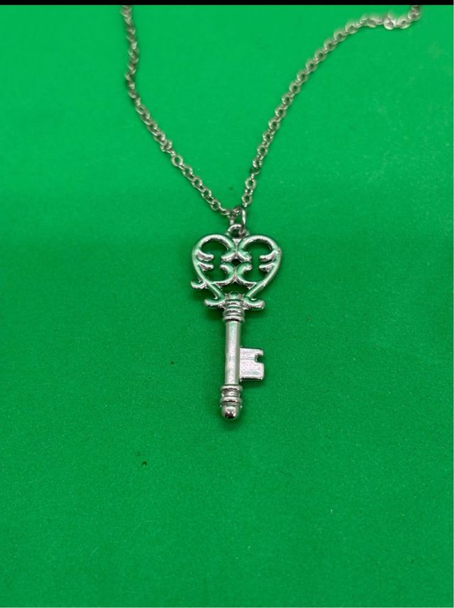 Colgante llave corazón acero inox