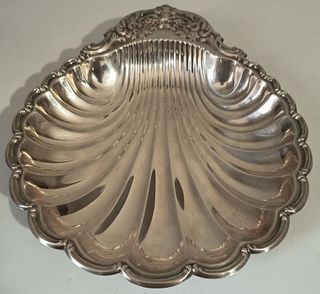 Centrotavola in metallo a forma di conchiglia 