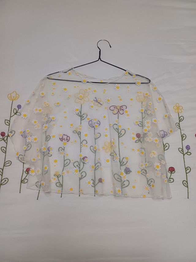 Blusa blanca transparente flores