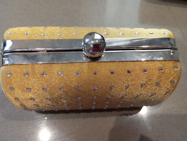 Borsette eleganti oro e nero