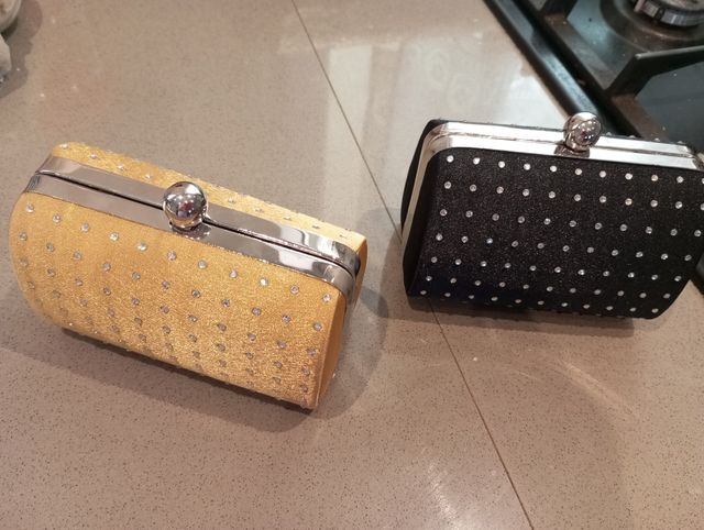 Borsette eleganti oro e nero