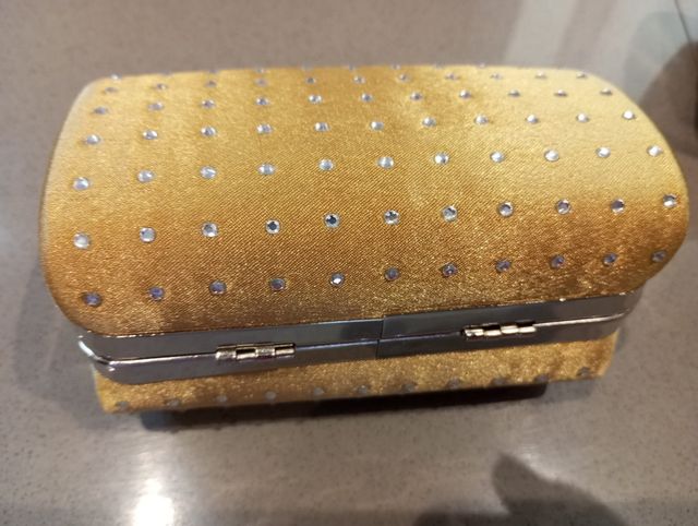 Borsette eleganti oro e nero