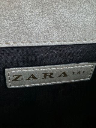 Bolso Zara dorado con pedrería