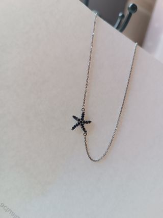 Colgante estrella Plata Ley 925 con circonitas.