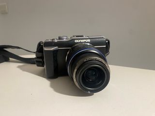 Olympus E-PL1 + zoom 14-42MM