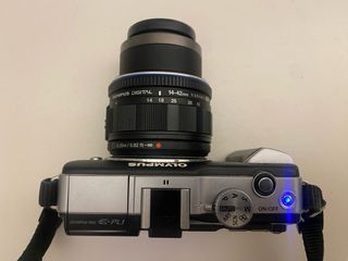 Olympus E-PL1 + zoom 14-42MM
