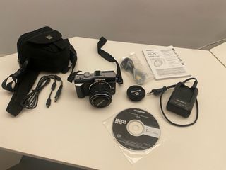 Olympus E-PL1 + zoom 14-42MM