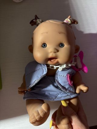 Muñeca con accesorios