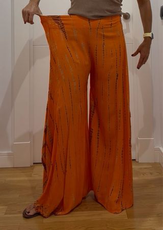 Pantalones anchos fluidos anaranjados