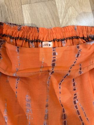Pantalones anchos fluidos anaranjados