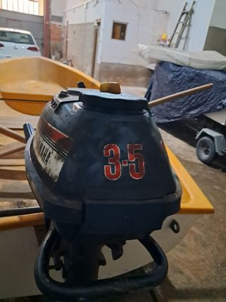 Lancha con motor Yamaha 1-100