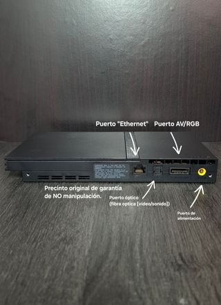 PlayStation 2 Slim + juegos y accesorios.