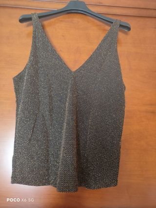 Top negro c/ brillos dorados