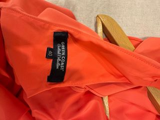 Mono naranja elegante/ coral 