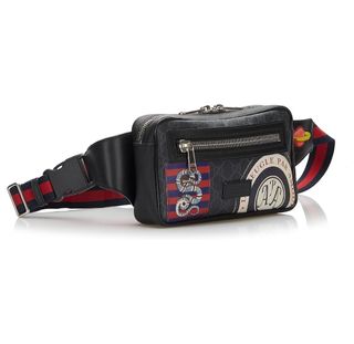 Riñonera Gucci negra y roja