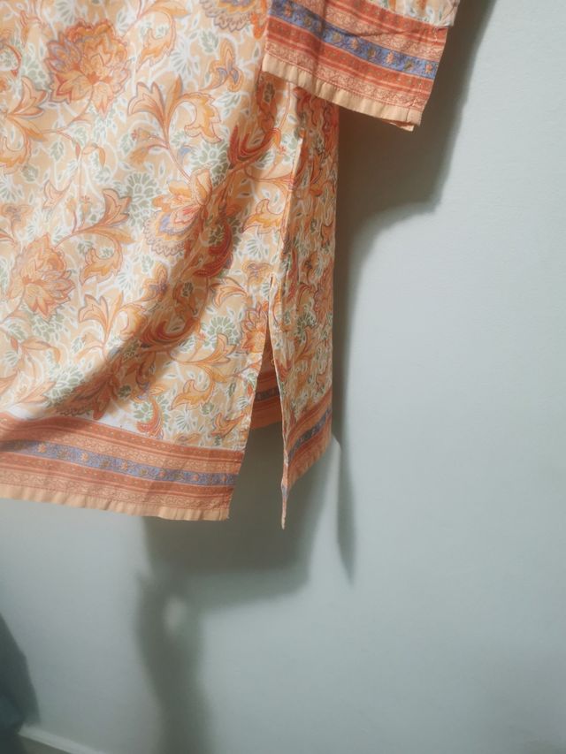 Camisola playa beige y naranja