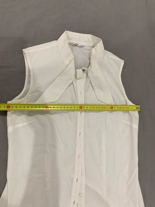 Blusa blanca sin mangas c/lazo