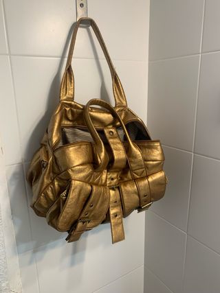 Bolso dorado efecto piel