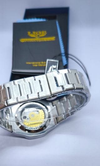Reloj LIGE automático azul celeste openheart