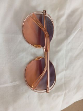 Gafas sol redondas doradas