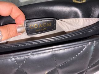Mini borsa Coach nera trapuntata